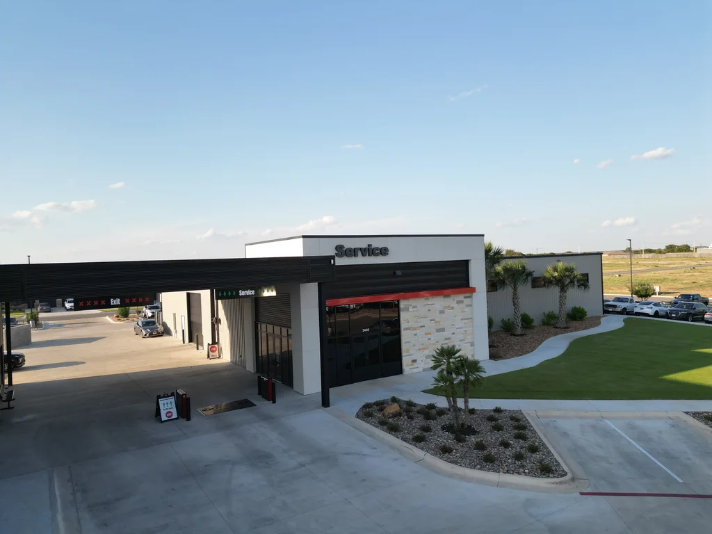 Elevated view of the McLeod Auto Sales service building and entrance.