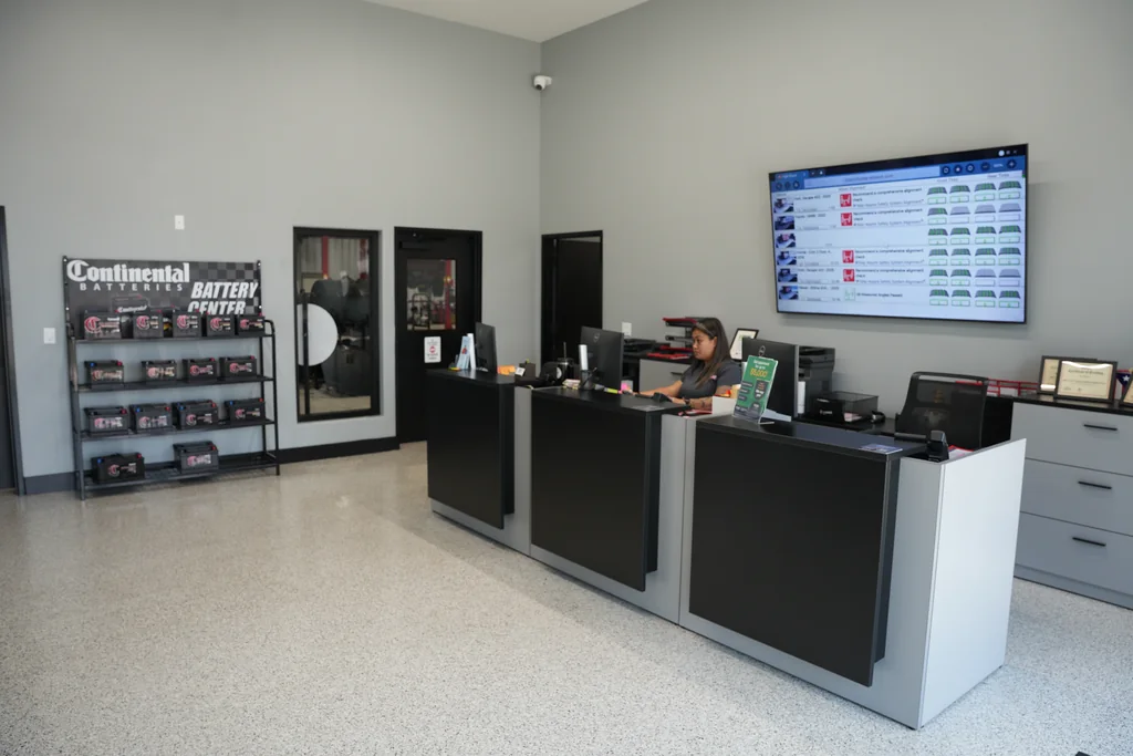 Service reception counter and customer waiting area.