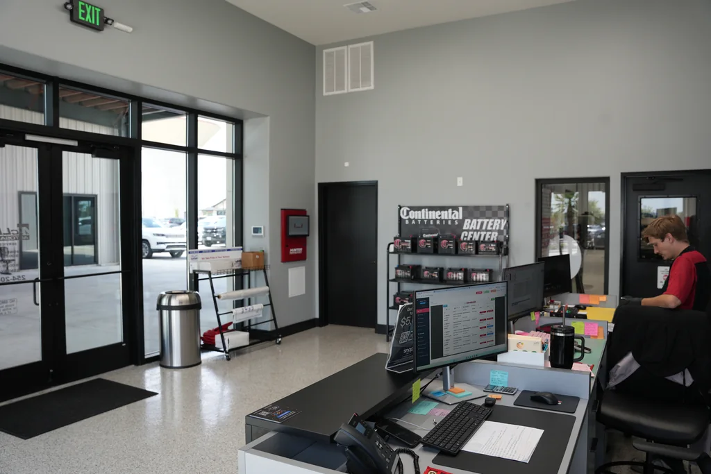 Service reception entrance, counter and customer seating.